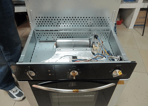 an oven cooling fan on the top of an oven